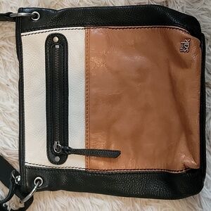 The Sak Black, White, and Tan Crossbody Bag